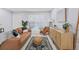 Comfortable living room with stylish furniture, natural light, and elegant hardwood floors at 867 Colony Dr # F92, Charleston, SC 29407