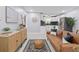 Cozy living area with plush sofa, modern decor, and seamless flow to kitchen at 867 Colony Dr # F92, Charleston, SC 29407