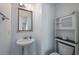 Cozy bathroom with vanity, toilet, and built-in shelving for storage at 8987 Planters Row Ln, Summerville, SC 29485
