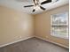 Bedroom with neutral walls, ceiling fan, and natural light at 8987 Planters Row Ln, Summerville, SC 29485