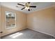 Bedroom with neutral walls, ceiling fan, and bright, natural light at 8987 Planters Row Ln, Summerville, SC 29485