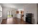 Cozy dining space with chandelier, sliding door to patio, and open flow to the kitchen at 8987 Planters Row Ln, Summerville, SC 29485