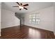 Bright living space with hardwood floors, neutral walls, window, and staircase access at 8987 Planters Row Ln, Summerville, SC 29485
