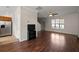 View of a living space seamlessly connected to a kitchen with stainless steel appliances at 8987 Planters Row Ln, Summerville, SC 29485