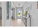 Welcoming entryway with light wood flooring, decorative accents, and ample natural light at 9009 Chato Ct, Summerville, SC 29483