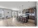 Spacious kitchen with a center island, stainless appliances, and a view to the backyard at 9009 Chato Ct, Summerville, SC 29483
