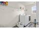 Bright laundry room with modern appliances, shelving and plenty of space at 9009 Chato Ct, Summerville, SC 29483