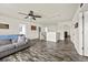 Upstairs loft area featuring hardwood floors, ceiling fan, and plenty of light at 9009 Chato Ct, Summerville, SC 29483