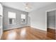Spacious bedroom with hardwood floors, bright windows, and closet providing ample storage space at 6 Kirkland Ln, Charleston, SC 29401
