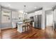 Open-concept kitchen boasts an island, stainless steel appliances, and abundant natural light at 6 Kirkland Ln, Charleston, SC 29401