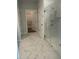 Bathroom with a luxurious glass-enclosed shower, marble tiling, and modern fixtures at 1035 Tulip Shell St, Summerville, SC 29485