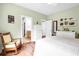 Bedroom with hardwood floors and attached bathroom at 1064 Blackbear Dr, Edisto Island, SC 29438