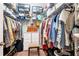 Walk-in closet features wire shelving and hanging storage for clothes and accessories at 1064 Blackbear Dr, Edisto Island, SC 29438