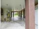 Expansive garage area with rocking chairs, offering ample space for parking and entertaining at 1064 Blackbear Dr, Edisto Island, SC 29438
