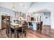 Open-concept kitchen with stainless steel appliances, bar seating, and a dining area at 1064 Blackbear Dr, Edisto Island, SC 29438