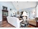 A bright and airy living room with hardwood floors, comfortable seating, and stylish decor at 1064 Blackbear Dr, Edisto Island, SC 29438