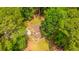 Aerial view of a home with a brick patio in a wooded setting at 110 Cantering Hills Ln, Summerville, SC 29483