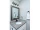 Bathroom featuring updated vanity, granite counters, a modern sink, and stylish lighting at 110 Cantering Hills Ln, Summerville, SC 29483
