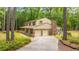Traditional two-story brick home with a lush, wooded lot at 110 Cantering Hills Ln, Summerville, SC 29483