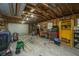 Inside a garage with tool chests and a workbench near a yellow cabinet at 110 Cantering Hills Ln, Summerville, SC 29483