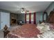 Spacious main bedroom with a ceiling fan, large windows, and a built-in desk at 110 Cantering Hills Ln, Summerville, SC 29483