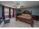 Spacious main bedroom with a ceiling fan, large windows, and carpeted floors at 110 Cantering Hills Ln, Summerville, SC 29483
