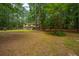 Charming two-story home nestled among tall trees on a large lot at 110 Cantering Hills Ln, Summerville, SC 29483
