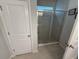 Modern bathroom featuring a glass-enclosed shower and neutral tiling at 111 Brant Dr, Summerville, SC 29483