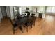 Open-concept kitchen and dining area with stainless steel appliances and hardwood floors at 111 Brant Dr, Summerville, SC 29483