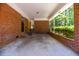Covered carport showing red brick and a concrete foundation, providing shelter and convenience at 113 Overhill Dr, Walterboro, SC 29488