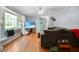 Cozy living room with a large sectional sofa, hardwood floors, and a decorative deer mount at 113 Overhill Dr, Walterboro, SC 29488