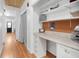 Convenient office nook with built-in desk, shelving, and storage at 113 Overhill Dr, Walterboro, SC 29488