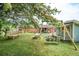 Spacious backyard featuring lush green lawn, mature trees, and plenty of room for outdoor activities at 1160 Landsdowne Dr, Charleston, SC 29412