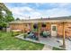 Brick home exterior showcasing a covered patio area, perfect for outdoor relaxation and entertaining at 1160 Landsdowne Dr, Charleston, SC 29412
