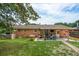 Home exterior with a covered patio, lush lawn, and well-maintained landscaping at 1160 Landsdowne Dr, Charleston, SC 29412