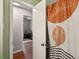 Bright bathroom view features a modern shower curtain design and doorway to the bedroom at 1160 Landsdowne Dr, Charleston, SC 29412