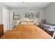 Comfortable bedroom with hardwood floors and a crib at 1160 Landsdowne Dr, Charleston, SC 29412