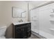 Bathroom showcasing a modern vanity, updated fixtures, and glass enclosed shower at 121 Harrison St, Varnville, SC 29944