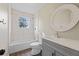 Clean, modern bathroom features a shower-tub combo, and vanity at 121 Harrison St, Varnville, SC 29944