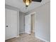 Bedroom with wood-look flooring and multiple doors at 121 Harrison St, Varnville, SC 29944