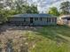 Charming exterior view of a home with a cozy front porch at 121 Harrison St, Varnville, SC 29944