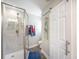 Bright shower features glass door, marble surround and rain shower head at 127 Travis Hill Rd, Moncks Corner, SC 29461