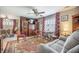 Inviting living room with wood accent wall, vintage furnishings, and ample seating at 127 Travis Hill Rd, Moncks Corner, SC 29461