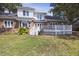Spacious backyard with a large deck, perfect for outdoor entertaining overlooking the serene landscape at 1280 Waterfront Dr, Mount Pleasant, SC 29464
