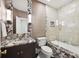 Modern bathroom featuring a decorative vanity, toilet, and tile at 1280 Waterfront Dr, Mount Pleasant, SC 29464