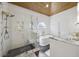 This bathroom features a glass enclosed shower and soaking tub with marble countertops and unique wood planked ceiling at 1280 Waterfront Dr, Mount Pleasant, SC 29464