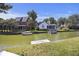 Beautiful waterfront homes along a canal with private docks and boats under a clear blue sky at 1280 Waterfront Dr, Mount Pleasant, SC 29464