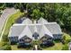 Aerial view of a multi-Gathering unit surrounded by mature trees, with a fountain pond at 1335 Hopton Cir # 1335, Mount Pleasant, SC 29466