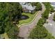 Overhead view of a pond with fountain, surrounded by multi-Gathering units and mature trees at 1335 Hopton Cir # 1335, Mount Pleasant, SC 29466