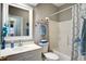 Clean bathroom with white vanity, toilet, tub, shower, and neutral gray walls at 1335 Hopton Cir # 1335, Mount Pleasant, SC 29466
